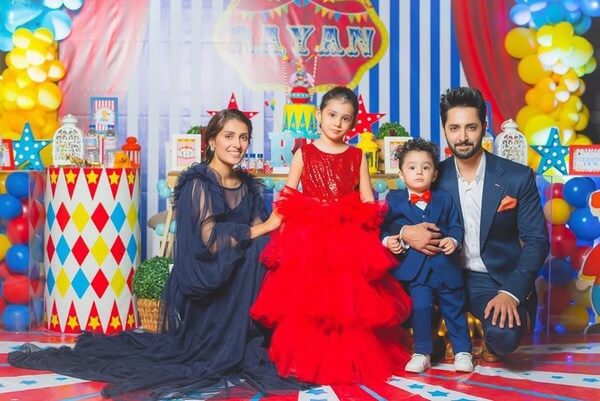 Premium Photo | Happy young family celebrates the first birthday of the  child. the baby is 1 year old. the concept of a children's party with  balloons