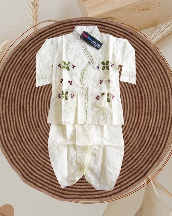 Ethnic lemon yellow toddler boy outfit with red-green embroidery, festive and stylish