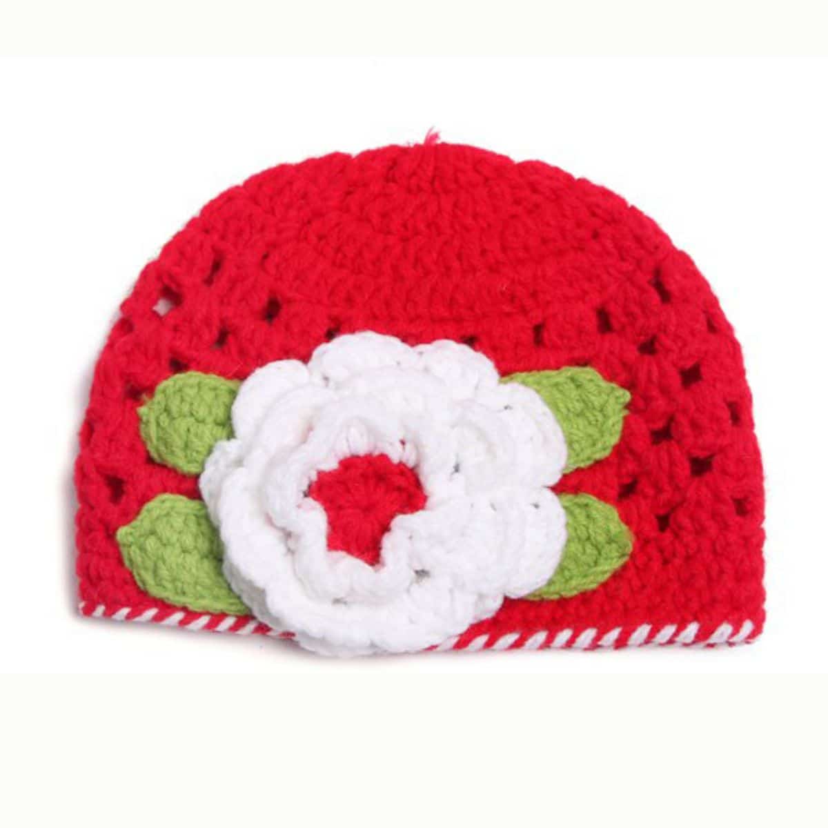bright-red-baby-cap-in-knitting-pattern-and-a-white-flower