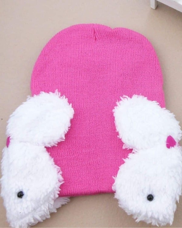 Pink bunny ear cap for baby girl in soft winter design, cute and warm for daily wear