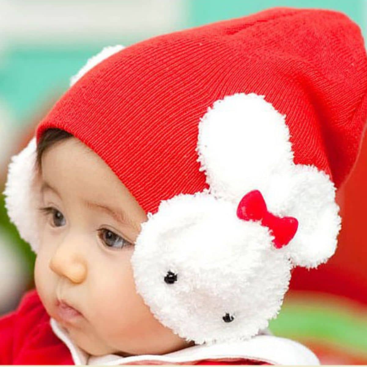 red-baby-cap-for-winter-with-white-bunnies-on-the-ears