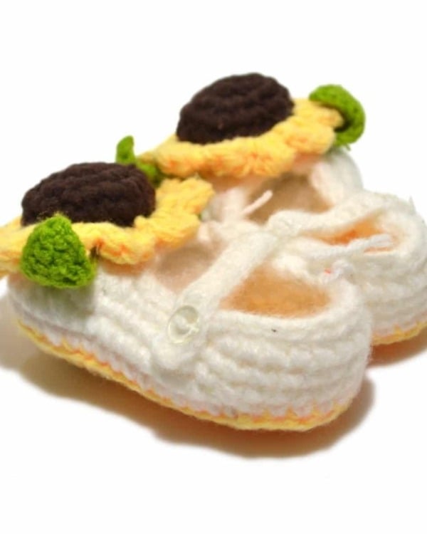 White and yellow crochet baby booties, cute toddler party accessory
