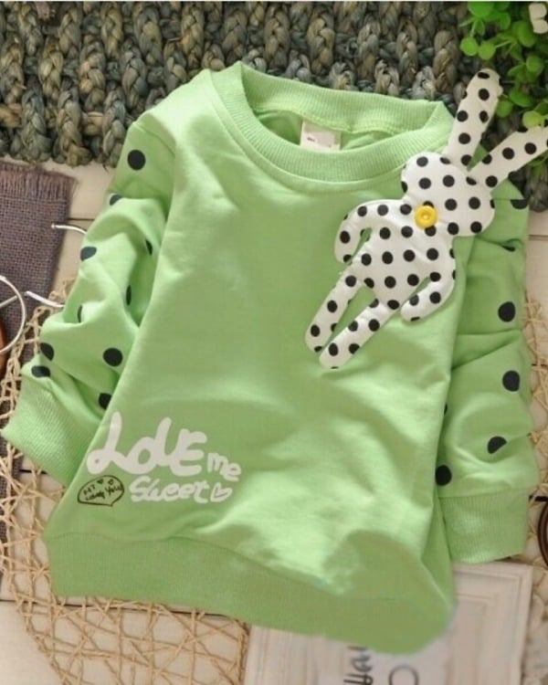 Pastel green winter sweatshirt with polka dots for kids, cozy festive wear