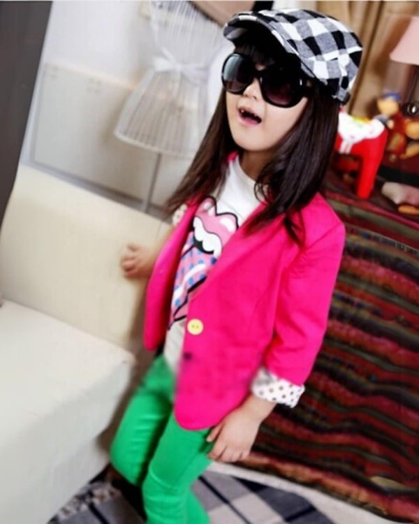 Stylish girls coat in pink with folded sleeves, cute and cozy for gifting or festive events