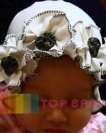 White baby cap with floral design soft cotton gift