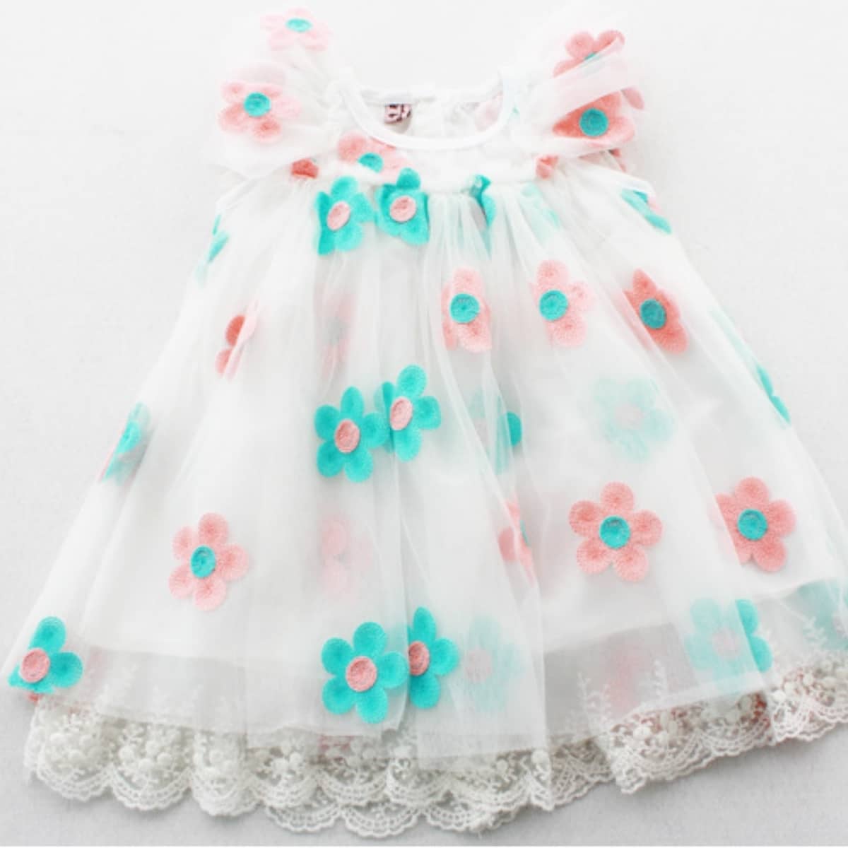 white-toddler-dress-with-pastel-pink-and-green-flowers-for-baby-girl
