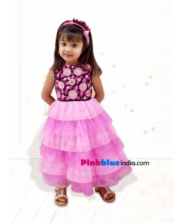 Pretty girls wedding gown in pink shades, festive and stylish