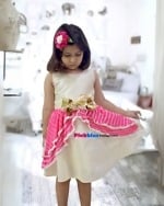 Ivory raw silk girls wedding dress with pink leheriya flare, elegant and stylish