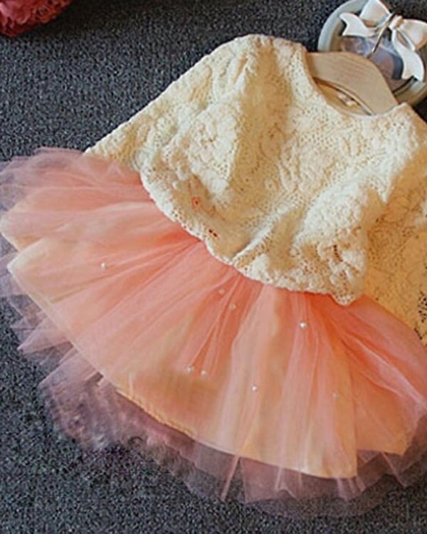 Peach and off-white frock for children, stylish and elegant for special occasions