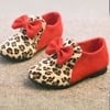 Red wedding girl shoes with animal print, cute and stylish for celebrations