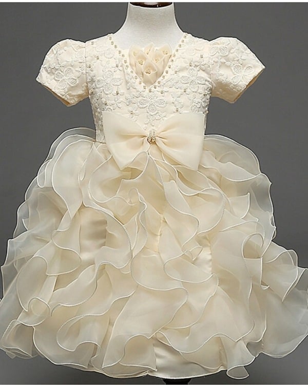 Stylish beige ruffle layer baby girl dress, cute and stylish for gifting or parties