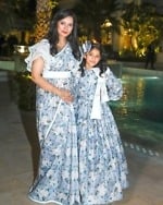 Mother-daughter matching sarees, stylish festive family outfit