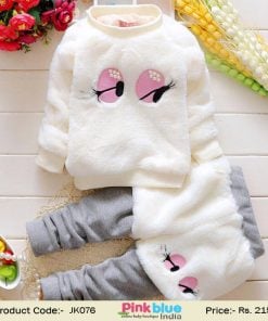 white baby pullover