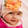 Shop Online White Summer Cap for Infant with Beautiful Orange Flower