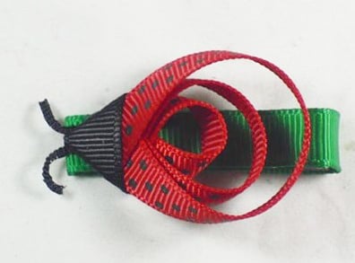 Buy Online Red and Black Beetle Shaped Hair Clip for Infants with Green Base
