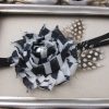 Sleek Black Infant Headband with Patterned Flower and Pearl Embellishment