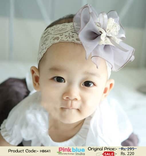 Smart White Designer Net Hair Band with Grey Flower for Newborn Princess