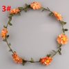 Tiara Style Hair Band for Toddlers in India with Arrangement of Light Orange Flowers