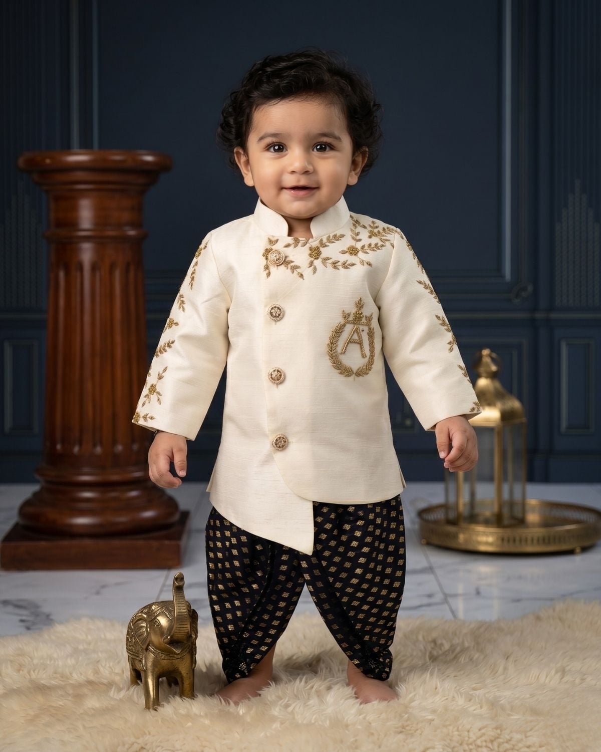 Toddler boy off white embroidered sherwani with black dhoti for wedding royal ethnic ceremony