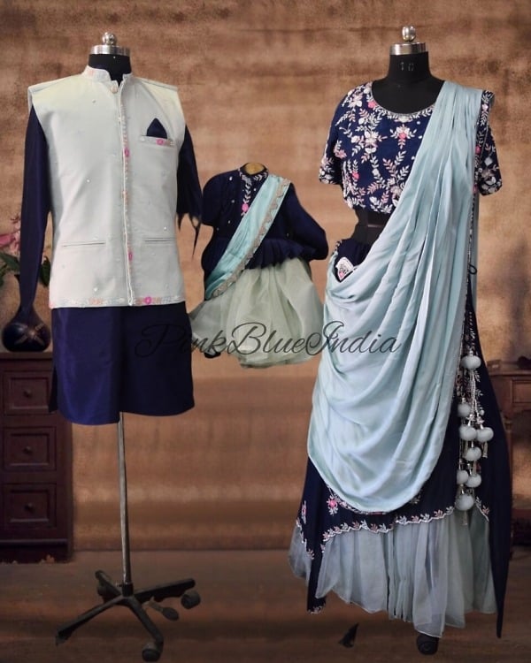 Family wedding matching ethnic outfits, cute mommy-daddy-baby style