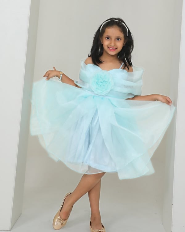 Back view of girls aqua blue organza off shoulder birthday frock with 3D fabric rose for small birthday party