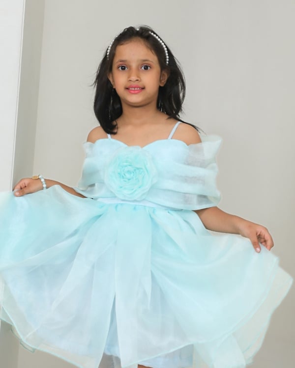 Girls aqua blue organza off shoulder birthday party frock with 3D rose and ruffle hem, full length front view