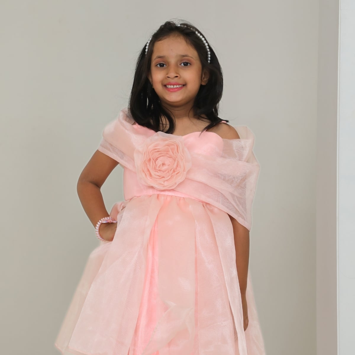 Girls beige cold shoulder birthday frock with 3D rose detail, custom made for small birthday parties and family gatherings